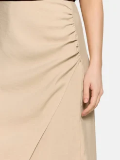 Cartoon Damen Wickelrock in beige gold